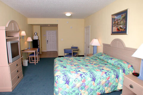 Beachside standard king motel room interior
