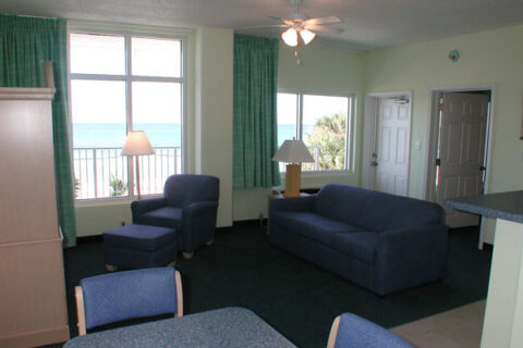 Living area of the Beachside deluxe queen suite motel room
