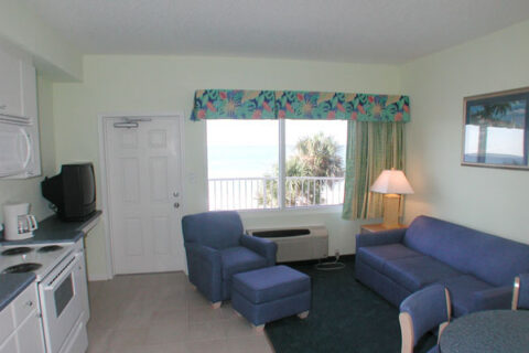 Interior window view of the Beachside regular queen suite motel room