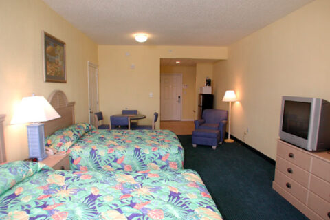 Interior view of the Beachside standard queen motel room